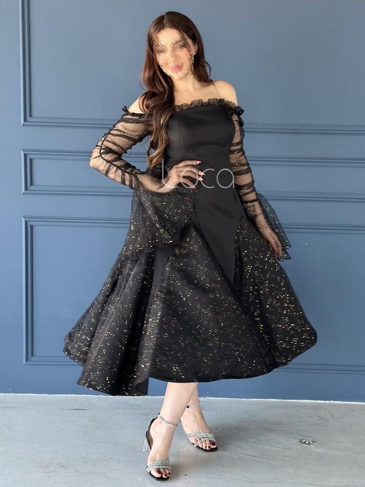 فستان اسود بأكمام بكشكش