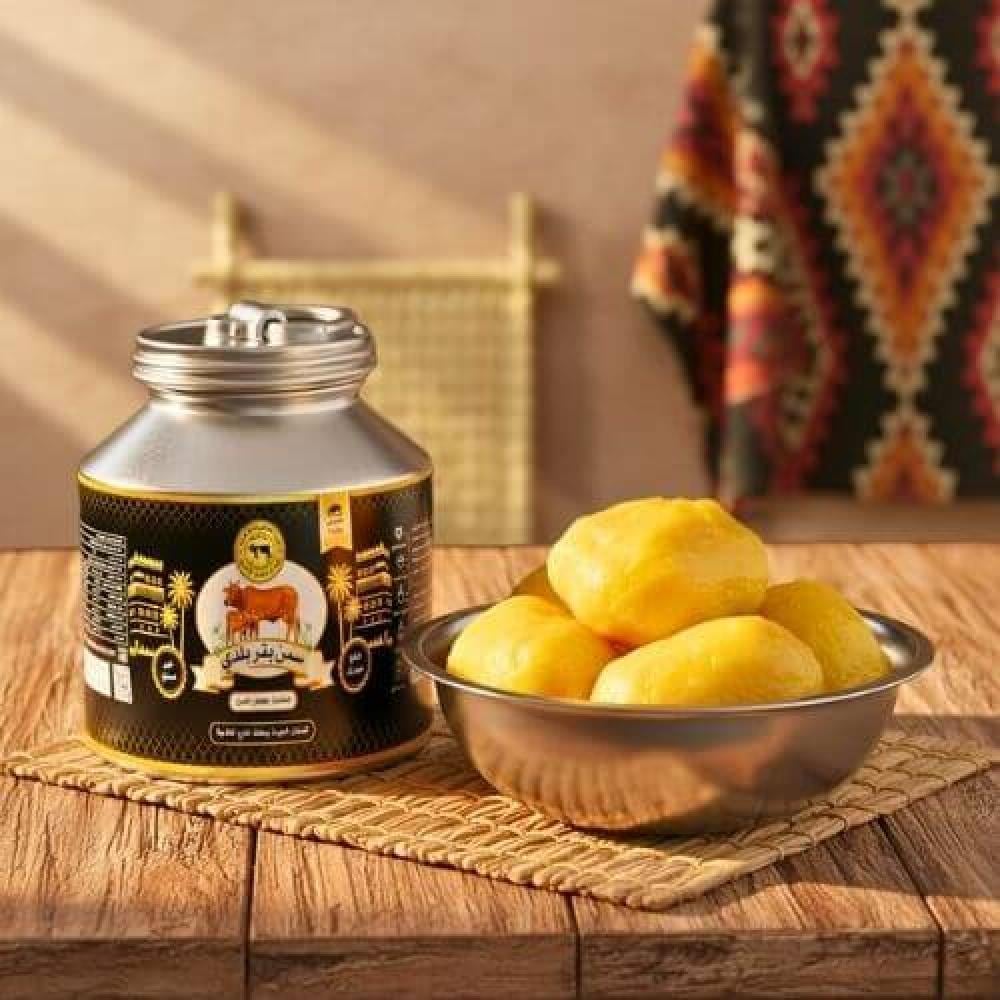 علبة سمن بقر بلدي نقي انتاج نجران بلون ذهبي غني تعكس الاصالة والجودة ا