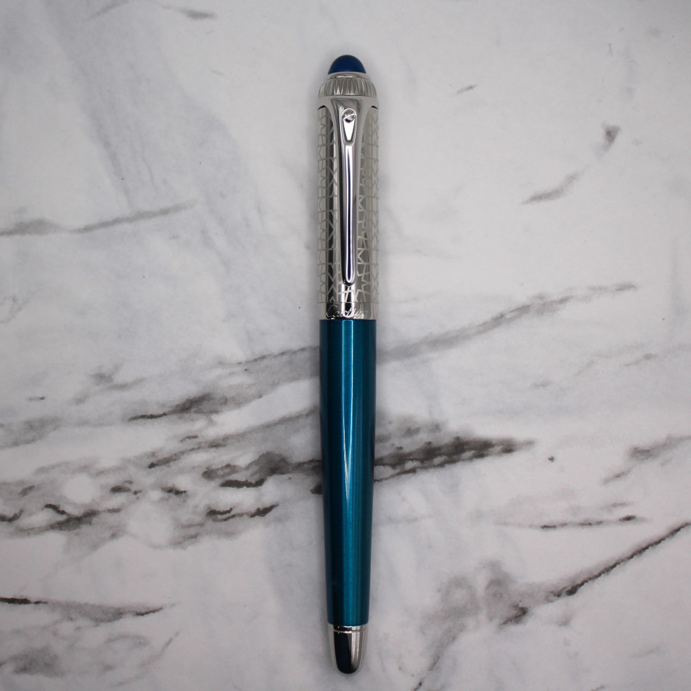 Cartier C5 pen turquoise and silver with a blue oval crystal