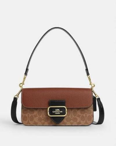 شنطة coach