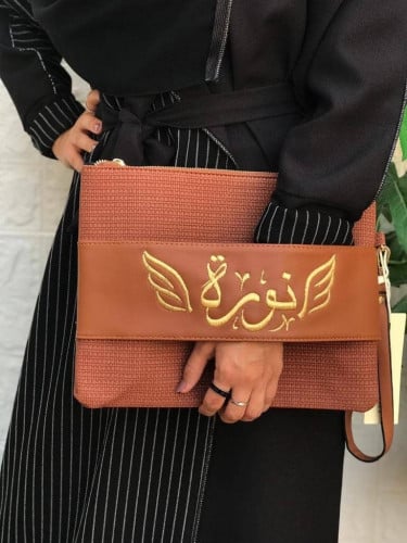 شنطه يد باوتش بالاسم