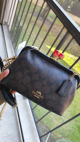 شنطة ماركة كوتش