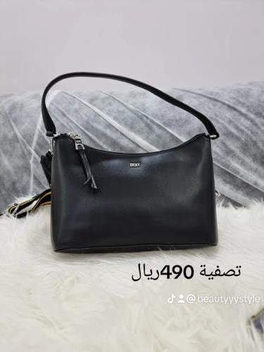 شنط دكني الحجم صغير مع سير طويل ^^