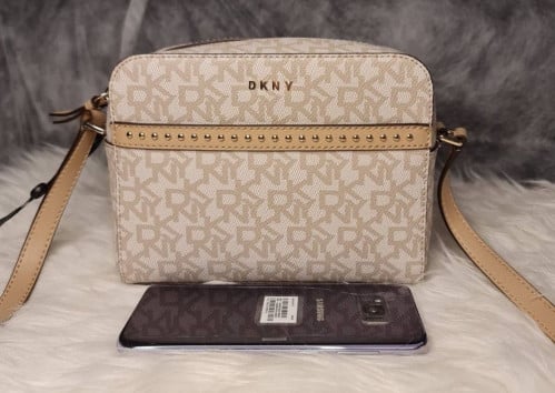 شنط دكني الحجم صغير مع سير طويل^^