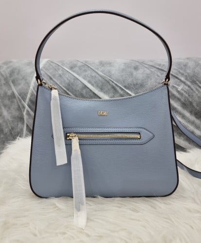 شنط دكني الحجم وسط مع سير طويل^^