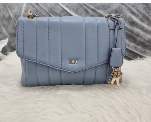 شنط دكني الحجم صغير مع سير طويل^^