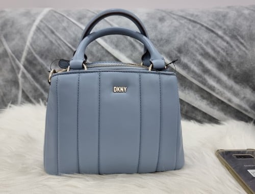 شنط دكني الحجم صغير مع سير طويل^^