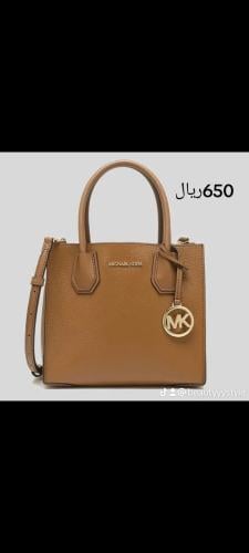 شنط مايكل كورس الحجم صغير مع سير طويل ^^