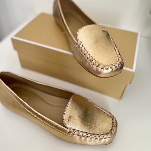 شوز فلات مايكل كورس ذهبي