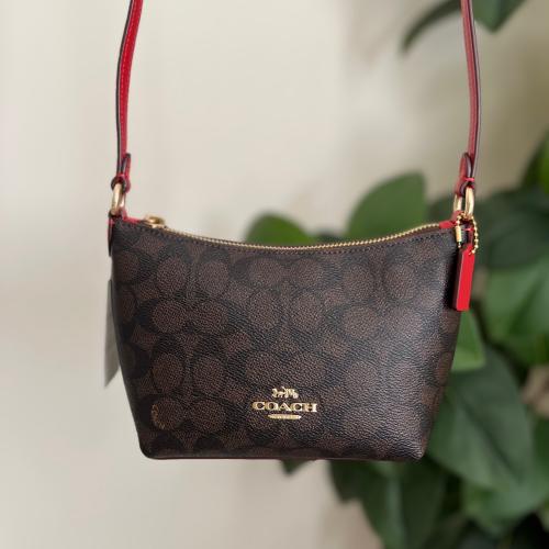 Zip Top Crossbody Bag In Signature Canvas