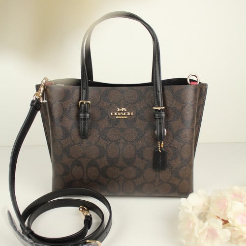 شنطة كوتش كروس بدي Mollie tote 25 بني غامق