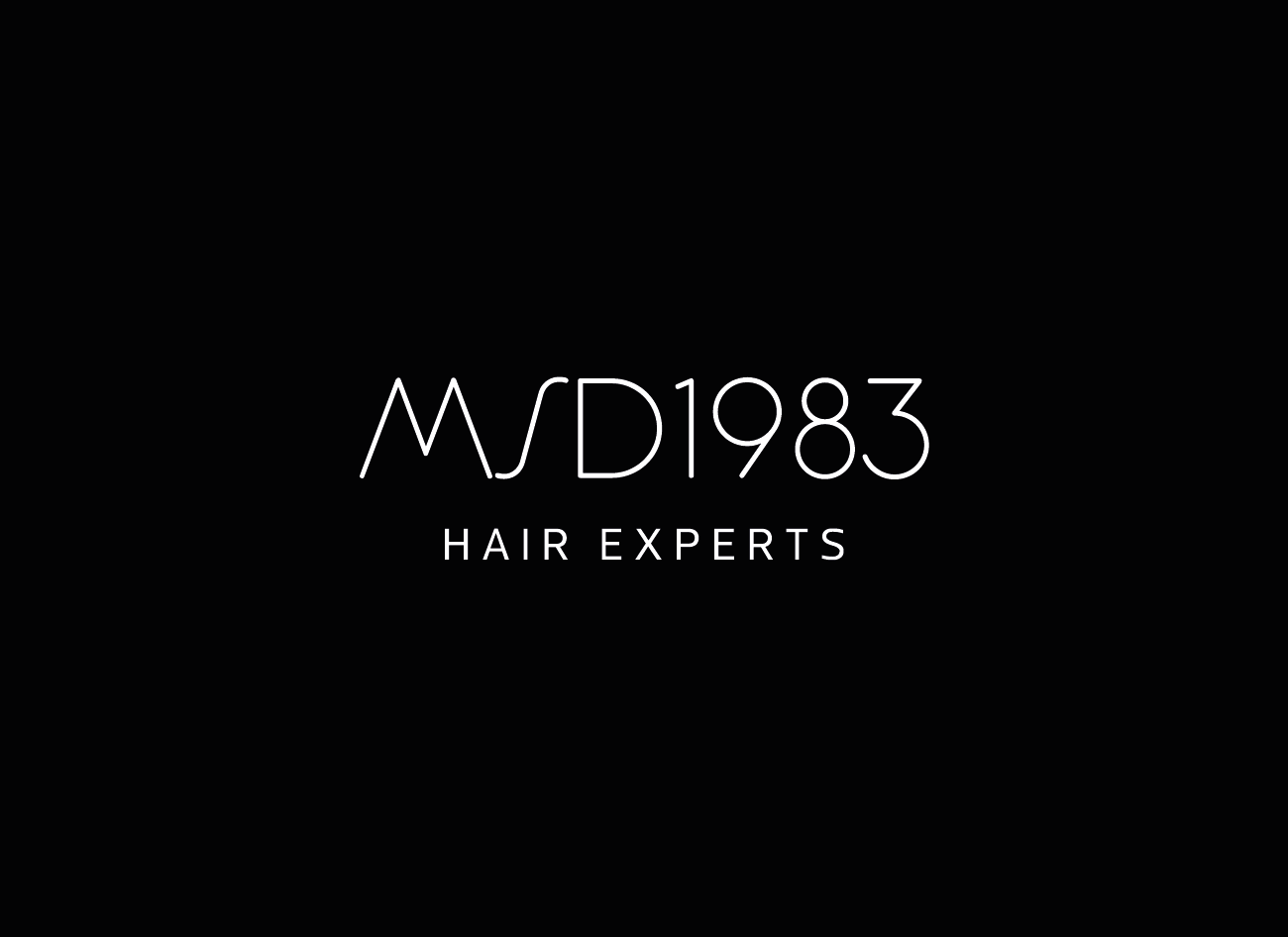 شعار MSD1983 – خبراء العناية بالشعر على خلفية سوداء