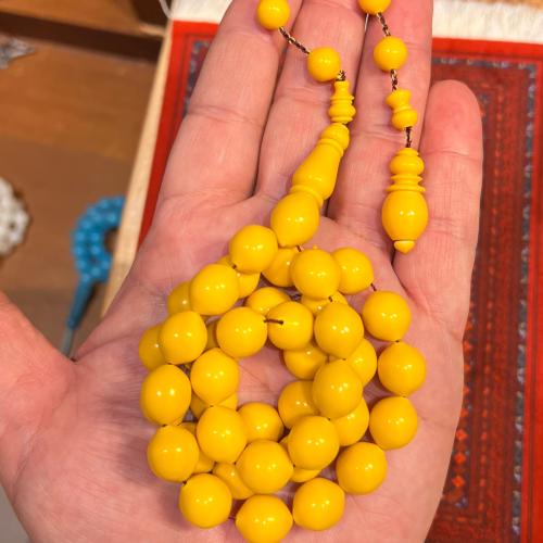 سبحة بولينق اصفر منقاوي