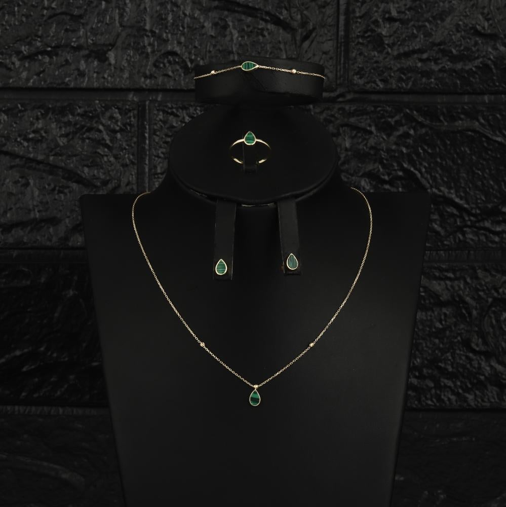 طقم ذهب قطرة ( عيار 18 )