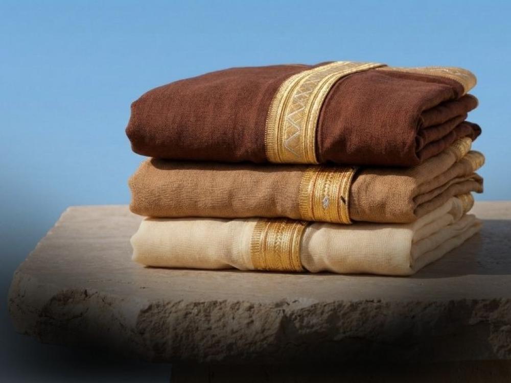 مشالح وملابس رجالية فخمة تبرز فخامة الرجل العربي