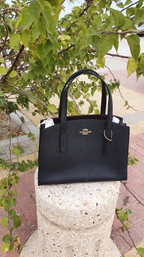 شنطة ماركة كوتش