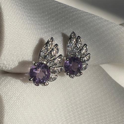 اقراط امثيست