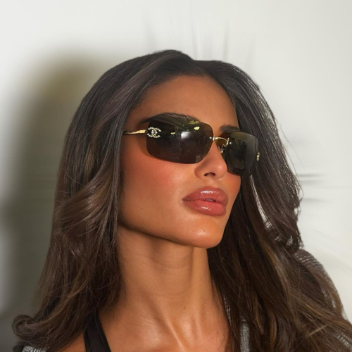 نظارة شانيل نسائية بإطار ذهبي وعدسات سوداء