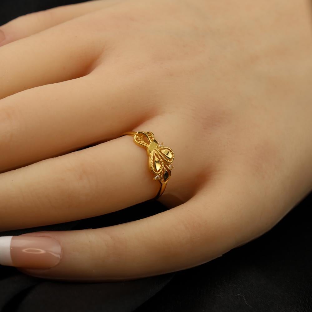 Gold ring with a bouquet design, size 13 الموقع الرسمي مجوهرات