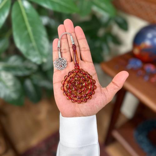 مسباح بكلايت أحمر شفاف
