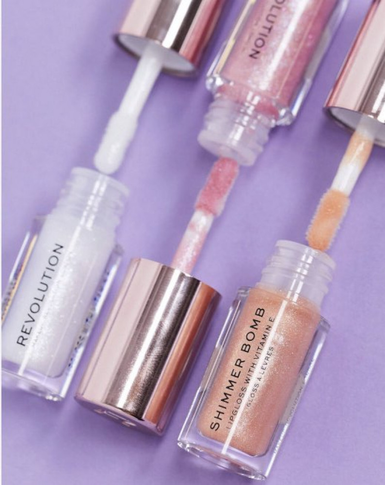 Шисейдо шиммер глосс. Шиммер для губ. Сияющий блеск шиммер для губ. Блеск revolution shimmer bomb. Shiseido shimmer gel gloss.