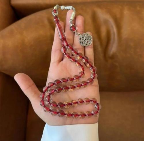 سبحة بكلايت شفاف خيط احمر