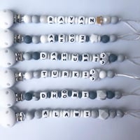 تعليقه مصاصه سلكون بالاسم