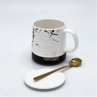 كوب سيراميكي (رخامي) بتصميم بسيط مع غطاء وملعقه ذه...