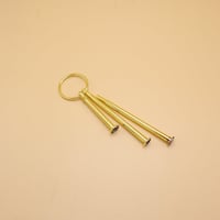 حامل أدوار معدني- رأس خاتم ذهبي