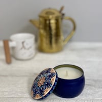 علبة حديد شمع معطر رائحة زهرة الأوركيد المتالقة