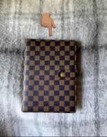 مفكرة باللون البني مقاس a5