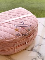 سرير متنقل وردي