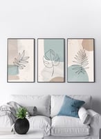 طقم من 3 لوحات كانفاس على إطار خشبي، تصميم أوراق ز...