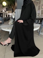 عباية بتطريز اسود على الكم نص كلوش - قماش ملكي