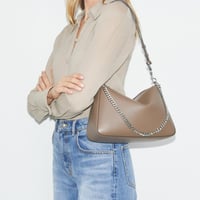 شنطة توري بورش بيري كاكي