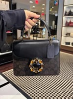 شنطه كوتش بني غامق كرستال