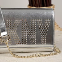 شنطة دكني لامعة سيلفر