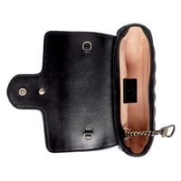 شنطه قوتشي ميني اسود