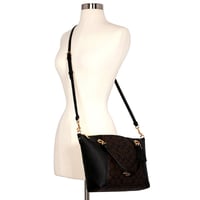 شنطة كوتش جلد سوداء