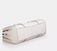 شنطة كوتش بريدجيت كريمي