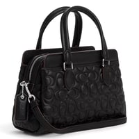 شنطة كوتش ميني كاريال سوداء