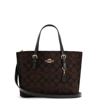 شنطه بشعار ماركه كوتش لون بني غامق