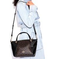 شنطة كوتش جلد سوداء