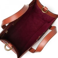 شنطة يد من كوتش لون بني