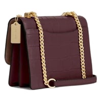 شنطة كوتش كروس بودي شفافة عنابي