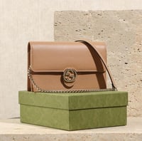 شنطة قوتشي راقيه بني