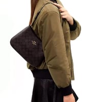 شنطة كوتش بينيلوبي بني