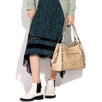 شنطة كوتش كريستي كاكي