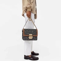 شنطة توس كروس سوداء