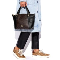 شنطة كوتش جلد سوداء